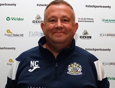 Image of Nick donning his Stockport County football tracksuit