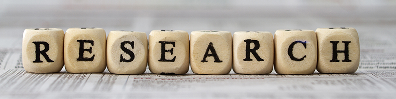 Image of letter blocks spelling out research