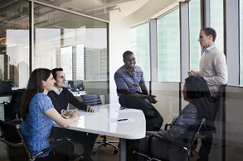 Five people in a business meeting