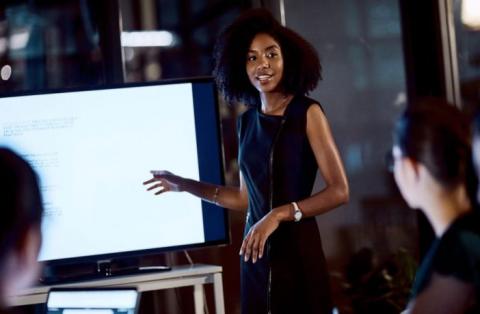 Person presenting in business environment