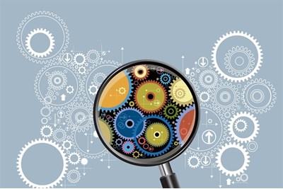 Picture of cogs and magnifying glass