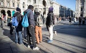 Photo of a group of people standing outside in Italy 