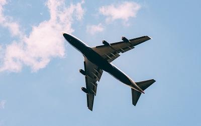 Photo of a plane in the air - Photo by Jordan Sanchez on Unsplash